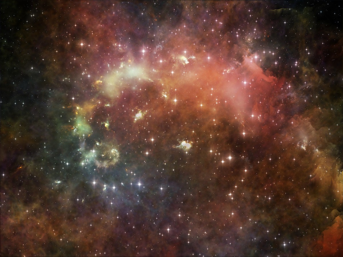 L’immagine di una nebulosa (cioè di una vasta nuvola di gas e polvere nello spazio interstellare) ripresa tramite un telescopio e rielaborata al computer (foto Shutterstock)